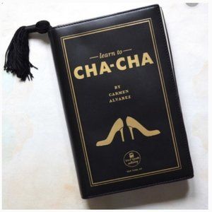kate spade learn to cha cha book leather clutch